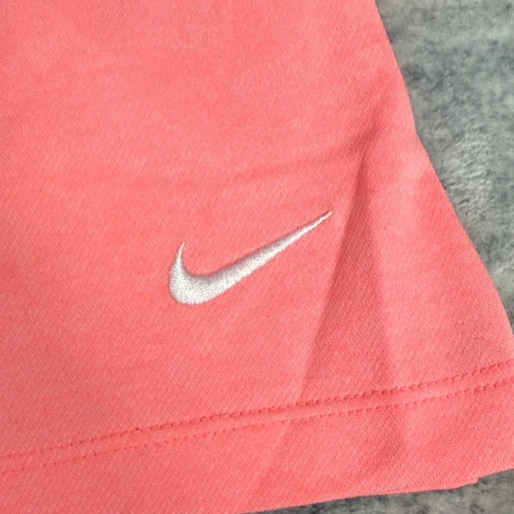 (106)Nike Women's Coral Button Down Sleeveless Top